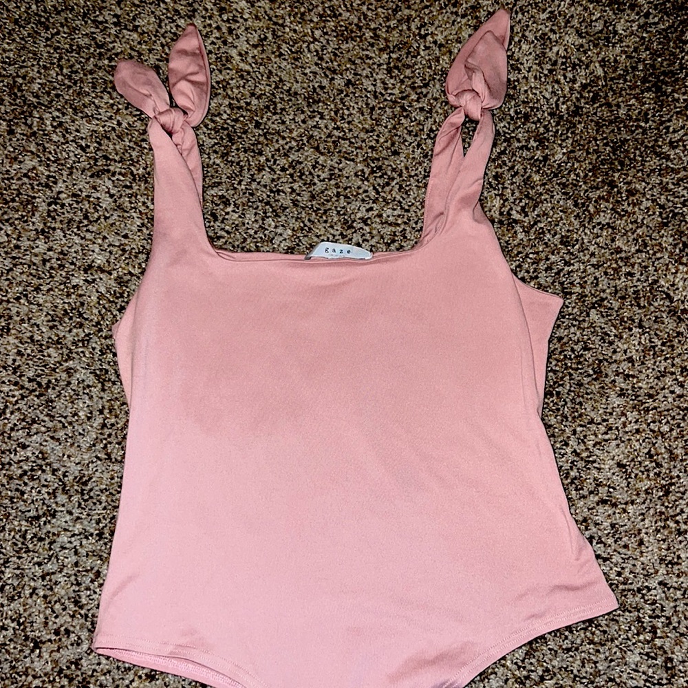 Boutique bodysuit. Ties on shoulder. Size medium